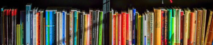 Vibrant collection of books on shelves for reading, research, and education.